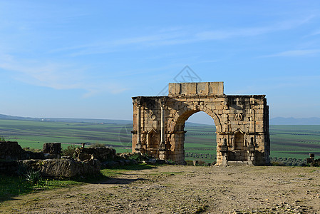 Volubilis 火山卷废墟历史柱子石头文化古董旅游古物建筑学大教堂图片