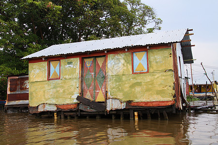 河边的家船屋建筑贫困森林乡村旅游运河木头漂浮热带图片