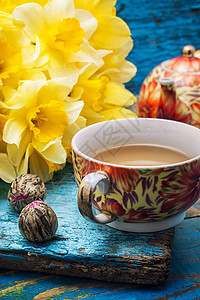 早茶叶子玻璃花瓣早餐香气季节花束植物群饮料水仙花图片