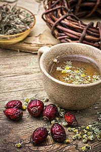 治疗青汤茶点山楂水果桌子浆果杯子种子饮料荒野草本植物图片