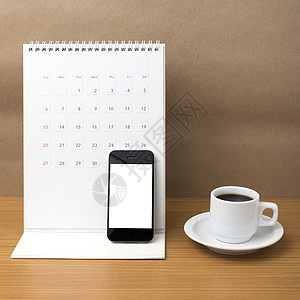 咖啡杯 电话和日历写作职场白色工作办公室商业笔记本杯子咖啡铅笔背景图片