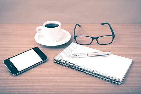 咖啡 电话 笔记和眼镜杯子白色职场办公室记事本工作商业笔记本写作桌子图片