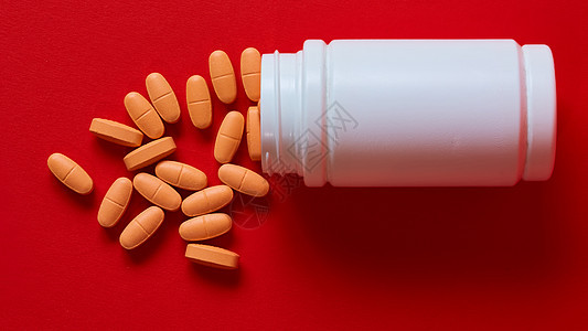 药瓶溢出的药瓶是红色的 上面有复制空间疼痛宏观处方科学止痛药制药药剂疾病治疗抗生素图片
