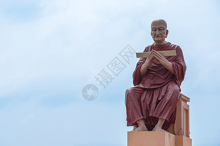 和尚雕像旅游阅读艺术宗教旅行沉思塑像文化寺庙天空图片