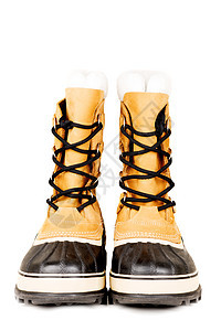 冬季高靴子 在白白色上被隔离皮革足件毛皮季节性棕褐色羊皮棕色女性工作室服装设计图片