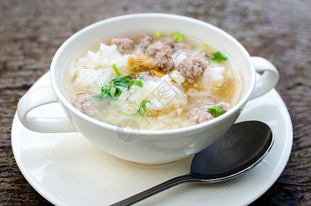 煮饭和猪肉早餐美食稀饭食谱烹饪餐厅午餐饮食食物背景图片