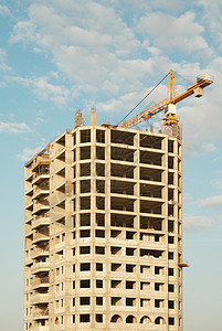 正在建造的房屋进步商业工程生长蓝色天空脚手架摩天大楼水泥建筑学图片