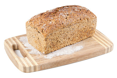 切碎板上的全餐面包食物厨房糕点玉米小麦木板脆皮美食木头棕色图片