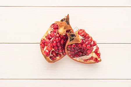 土木木背景上的石榴水果木头团体食物桌子盘子饮食果汁织物营养图片