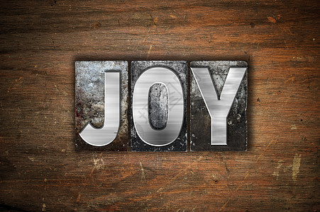 Joy概念 金属彩印类型狂喜魅力喜悦欢呼幸福打字稿快乐乐趣字母凸版图片