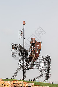 铁制成中世纪骑士的雕像艺术套装历史头盔金属盔甲图片