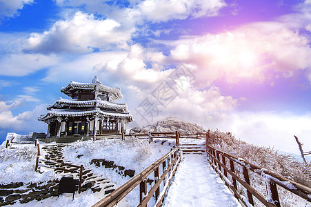 韩国风景南韩冬季下雪淹没了Deogyusan山脉晴天太阳旅游国家天气故事寺庙森林墙纸天空背景