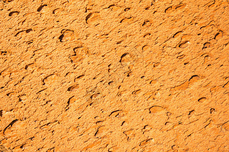 沙石墙岩石侵蚀石头分层棕色砂岩材料宏观背景图片