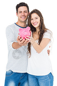 持有小猪银行的夫妇感情存钱罐浪漫情人夫妻男朋友情怀女朋友亲密感金融图片