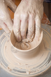 陶匠的手花瓶工艺女士车轮工作艺术杯子模具水壶黏土图片