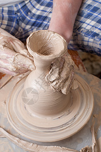 陶匠的手艺术车轮模具作坊拇指水壶杯子陶器工匠工艺图片