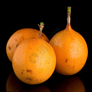 辣椒果浆花粉美味黄色橙子舌肌黑色团体热情水果热带种子图片