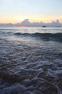 巴厘日落日出热带太阳海滩海洋多云蓝色海浪天空阳光图片