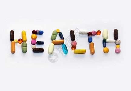 多彩药丸宏观医学药品抗生素黄色保健绿色胶囊红色止痛药背景图片