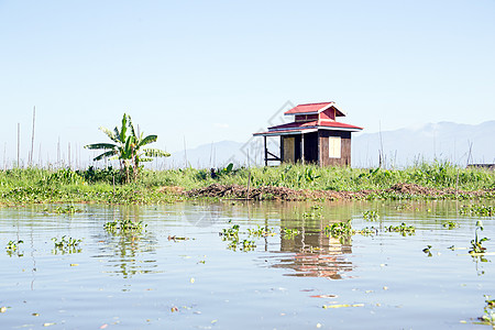 缅甸内尔湖传统漂浮村居 缅甸地标旅行建筑天空渔夫宝塔入口乡村旅游房子图片