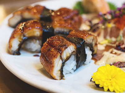 单生寿司黑色文化食物餐厅奢华寿司盘子午餐美食海鲜图片