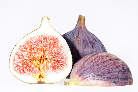 白色背景的鲜无花果实结晶小吃热带红色无花果饮食食物紫色种子营养异国图片