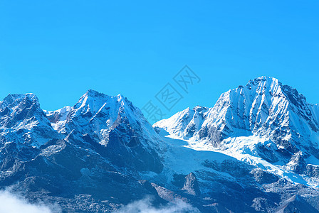高山 被雪覆盖假期顶峰冰川季节运动全景滑雪爬坡岩石干城图片