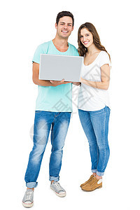 使用笔记本电脑的幸福情侣服装技术女朋友微笑夫妻感情男人休闲男朋友女性图片
