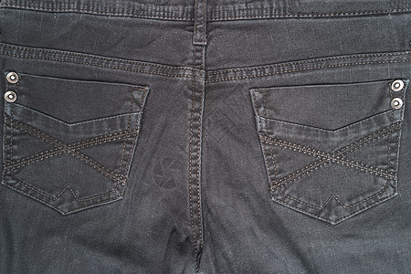 黑色牛仔牛仔裤裤袋的特写细节牛仔布荒野衣服靛青织物宏观棉布空白服装纺织品图片