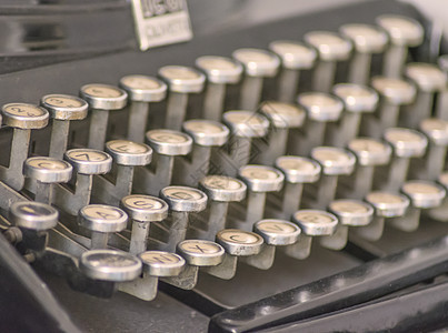旧打字机字母圆圈首都古董语言金属机器钥匙回忆宏观背景图片