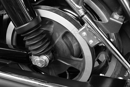 黑色和白色摩托车式的紧紧腰带驱动车轮自行车摩托车发动机驾驶合金菜刀艺术图片