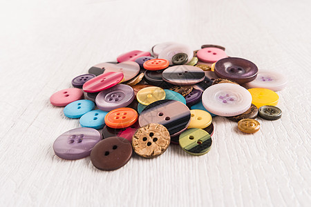 不同彩色按钮的一组工艺收藏衣服针线活夹克缝纫团体圆圈裙子纺织品图片