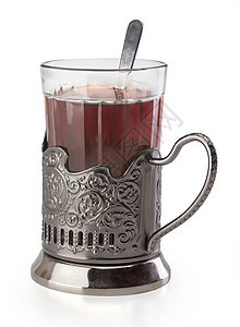 一杯茶在金属玻璃容器里茶匙勺子杯子黑色持有者玻璃架装饰图片