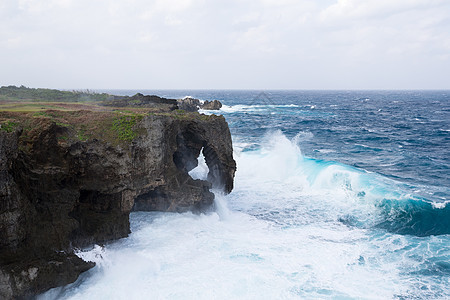 冲绳的曼扎莫角珊瑚场景地标石头码头村庄岩石土地海岸海湾图片