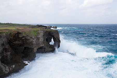 冲绳曼扎角土地海岸海浪石头码头悬崖海景波纹太阳天空图片