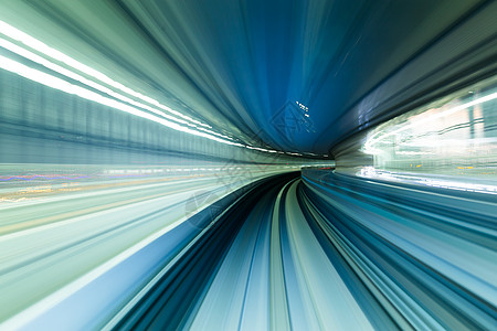 高速火车在隧道中行驶通勤者运输管子场景交通运动旅行曲线过境城市图片