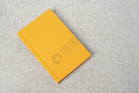 桌上的黄书笔记本字典学校织物棉布作品办公室研究脊柱教育图片