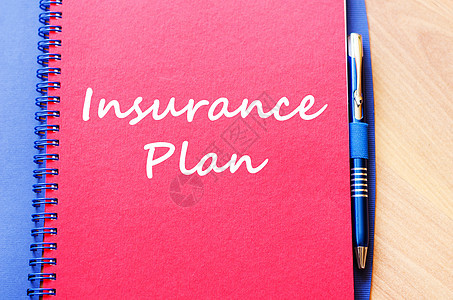 保险计划在笔记本上写入公司文档代理人药品合同房主抵押房子商业投资图片