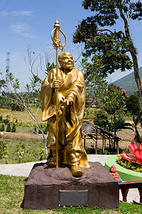 复杂的帕果达埃卡亚纳的肥和尚雕像神社地标历史性旅行火山文化游客宝塔天空建筑学图片