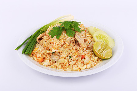 泰国曼谷泰式炒米饭和猪肉 泰国曼谷洋葱美味大豆胡椒饮食营养炒锅美食黄瓜蔬菜图片