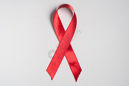 艾滋病宣传  红丝医疗机构白色疾病意识警觉剪裁红色丝绸勋章图片