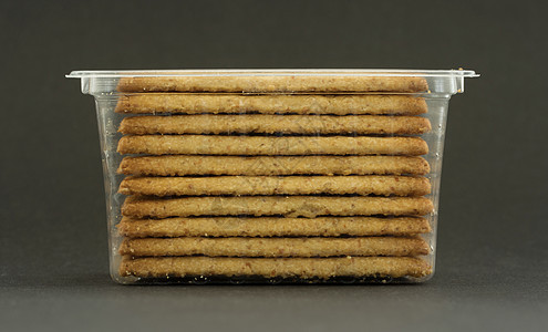 塑料刻板机膳食食物香味玉米饼干零食脆皮面包美味小麦背景图片