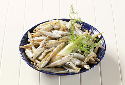 一碗新鲜的鱼营养银鱼鳀鱼鲱鱼海鲜团体食物茴香图片