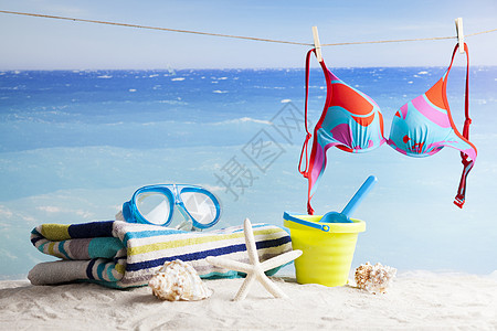 夏季背景 游泳和日光浴的海滩附件泳装面具天空海星潜水员贝壳支撑海滨热带人字图片