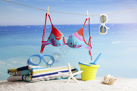 夏季背景 游泳和日光浴的海滩附件热带海洋闲暇天空面具海滨娱乐防晒霜海星海岸图片