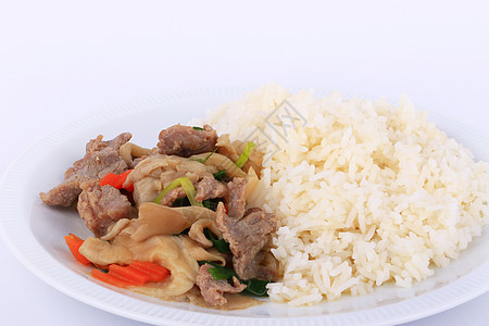 大米和炸牛肉 白菜上加牡蛎酱食物油炸白色主菜盘子桌子绿色午餐蔬菜健康图片