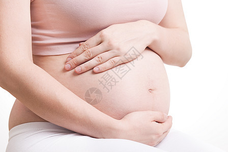 白背景年轻有吸引力的孕妇美丽的肚子肚皮 白色背景腹部母亲后代女孩婴儿女性父母母性女士怀孕图片