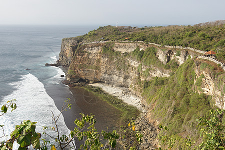 海清寺印度尼西亚巴厘岛 吉姆巴兰支撑岩石旅游旅行景点海岸全景海洋背景