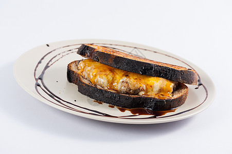 配有各种奶酪的三明治食物营养饭馆面包早餐餐厅午餐小吃烹饪美食图片