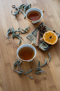 茶叶 干肉桂 橘子和木本底的Aise美食坚果咖啡店烹饪香气早餐八角饮料力量橙子图片
